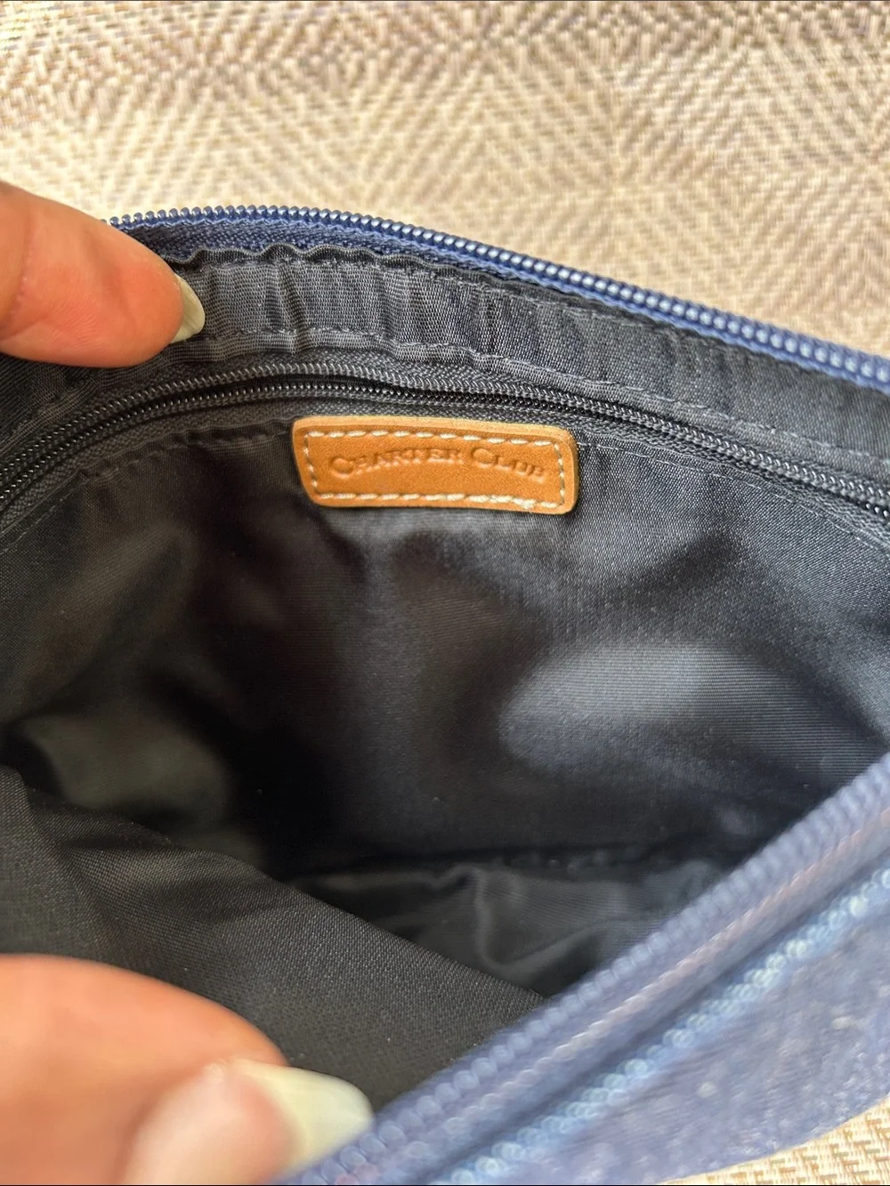 Charter Club Navy Denim mini bag with Blue Floral Embroidery and Tan Strap.